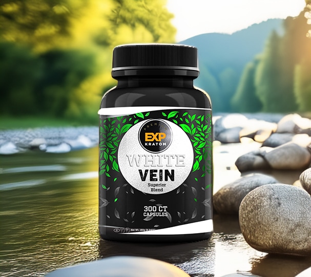 A close-up shot features a bottle labeled "EXP Premium White Vein Capsules," containing 300 capsules, elegantly positioned on a smooth rock by a tranquil river, with lush trees and majestic mountains forming the picturesque backdrop.