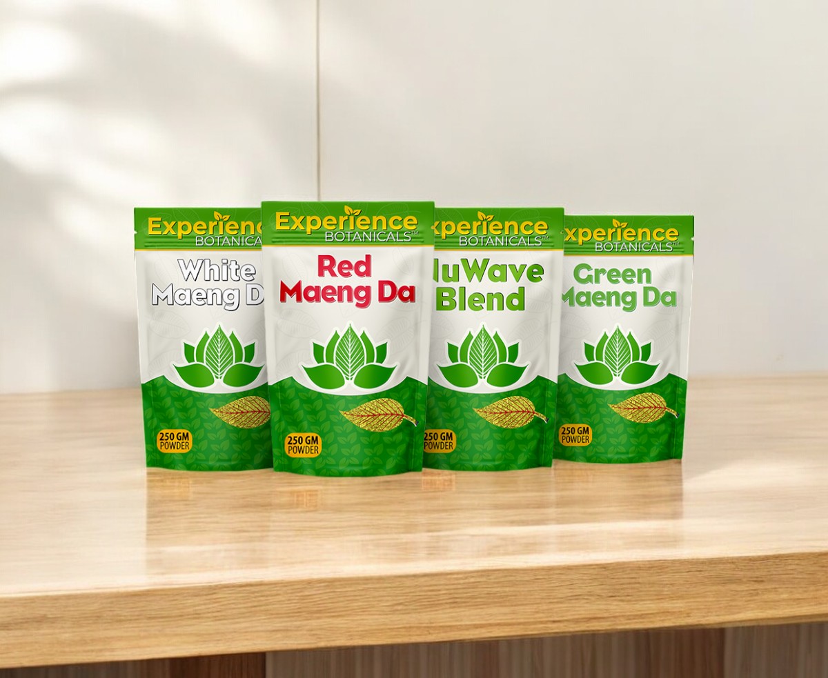 The Experience Powder bags Split Kilo Bundle, offering a selection of four varieties including White Maeng Da, Red Maeng Da, JuWave Blend, and Green Maeng Da, is elegantly arranged on a wooden surface. This collection highlights premium kratom powder for discerning herbal enthusiasts.